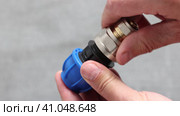 Pipe connector adapter with PE compression fitting and male threaded for connecting metal pipes. Стоковое видео, видеограф Владимир Григорьев / Фотобанк Лори