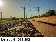 Рельсы на закате. Стоковое фото, фотограф Илья Юрукин / Фотобанк Лори