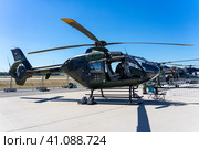 BERLIN, GERMANY - JUNE 23, 2022: Twin-engine helicopter Eurocopter EC135 T1 (now Airbus Helicopters H135). Exhibition ILA Berlin Air Show 2022. Редакционное фото, фотограф Sergey Kohl / Фотобанк Лори