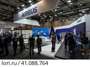 BERLIN, GERMANY - JUNE 23, 2022: Stand of a European multinational aerospace corporation Airbus. Exhibition ILA Berlin Air Show 2022. Редакционное фото, фотограф Sergey Kohl / Фотобанк Лори