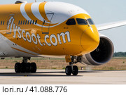 BERLIN, GERMANY - JUNE 23, 2022: Wide-body jet airliner Boeing 787-8 Dreamliner of Scoot airline. Редакционное фото, фотограф Sergey Kohl / Фотобанк Лори