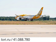 BERLIN, GERMANY - JUNE 23, 2022: Wide-body jet airliner Boeing 787-8 Dreamliner of Scoot airline. Редакционное фото, фотограф Sergey Kohl / Фотобанк Лори