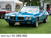 DIEDERSDORF, GERMANY - AUGUST 30, 2020: The muscle car Pontiac GTO, 1970. The exhibition of "US Car Classics". Редакционное фото, фотограф Sergey Kohl / Фотобанк Лори