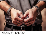 Handcuffed hands close-up. Стоковое AI-изображение, AI-художник Юрий Поздников / Фотобанк Лори