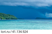 Beautiful Blue Lagoone shortly before Thunderstorm, Gam Island, West Papuan, Raja Ampat, Indonesia (2016 год). Стоковое фото, фотограф Igor Tichonow / Фотобанк Лори