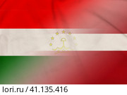 Tajikistan and Latvia national flag international relations LVA TJK. Стоковая иллюстрация, иллюстратор Кабак Дмитрий / Фотобанк Лори