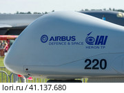ERLIN, GERMANY - JUNE 03, 2016: Detail of reconnaissance UAV IAI Eitan (Steadfast), also known as Heron TP by the Malat division of Israel Aerospace Industries. Exhibition ILA Berlin Air Show 2016. Редакционное фото, фотограф Sergey Kohl / Фотобанк Лори