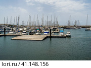 PLAYA BLANCA, LANZAROTE - JULY 18, 2022: Marina Rubicon of Playa Blanca. Playa Blanca is the southernmost town of the Spanish island of Lanzarote. It is the newest resort on the island. Редакционное фото, фотограф Sergey Kohl / Фотобанк Лори