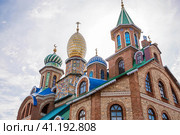 The main attraction of the city. The Temple of All Religions in Kazan.Kazan City, Republic of Tatarstan, Russia, September 2023. Редакционное фото, фотограф Photojuli / Фотобанк Лори