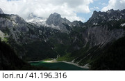 Aerial view of Hinterer Gosausee lake and Dachstein mountain top in background, Upper Austria. Стоковое фото, фотограф Igor Tichonow / Фотобанк Лори