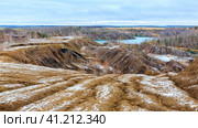 Abandoned coal quarries near Konduki village, Romantsevskie mountains, Russia. Стоковое фото, фотограф VittoriaChe / Фотобанк Лори