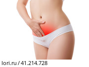 Woman with abdominal pain, stomachache isolated on white background. Стоковое фото, фотограф Станислав Тарко / Фотобанк Лори