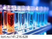 Test Tubes Filled with Liquid. Стоковое AI-изображение, AI-художник Поликарпов Владимир Владимирович / Фотобанк Лори