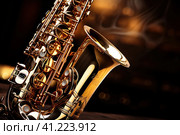 Saxophone on Wooden Table. Стоковое AI-изображение, AI-художник Поликарпов Владимир Владимирович / Фотобанк Лори