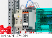 The CM-MPS input voltage monitoring module from ABB, installed in an electrical switchboard. (2023 год). Редакционное фото, фотограф Нелик Дулатов / Фотобанк Лори