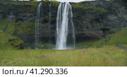 Static front shot of Beautiful Seljalandsfoss waterfall Iceland. Стоковое видео, видеограф Igor Tichonow / Фотобанк Лори