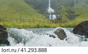 Foss a Sidu Waterfall in foggy weather near Kirkjubaejarklaustur, Iceland. Стоковое видео, видеограф Igor Tichonow / Фотобанк Лори
