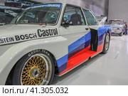 BMW 320i E21 as seen from the side. The car took part in Group 5 in the late '70s. BMW Museum showroom (2011 год). Редакционное фото, фотограф Воловодов Владимир / Фотобанк Лори