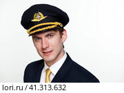 Young man in the form of a passenger plane pilot. Стоковое фото, фотограф Андрей Аркуша / Фотобанк Лори