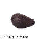 Haas Avocado fruit isolated over the white background. Стоковое фото, фотограф Сергей Долгов / Фотобанк Лори