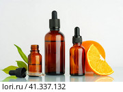 Vape liquid with orange flavor on white background. Стоковое фото, фотограф Сергей Толмачёв / Фотобанк Лори