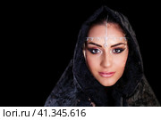 Beautiful Woman in Middle Eastern Niqab veil on isolated black background. Стоковое фото, фотограф Андрей Аркуша / Фотобанк Лори