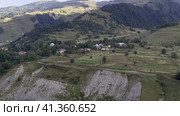 Panorama of the mountain landscape in clear weather. The beauty of a mountain valley. The Caucasus Mountains. Стоковое видео, видеограф Ярославский Максим / Фотобанк Лори