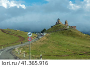 Trinity Church in Gergeti near Mount Kazbegi. Stepantsminda. Georgia. 06.09.2023. Редакционное фото, фотограф Ярославский Максим / Фотобанк Лори