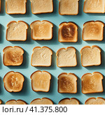 Croutons of white bread on a homogeneous background. Generated by AI. Стоковое AI-изображение, AI-художник Ярославский Максим / Фотобанк Лори