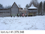 The festival is a historical reconstruction of the Viking Age in winter. Vikings attack with shields and helmets (2014 год). Редакционное фото, фотограф Анна Кривицкая / Фотобанк Лори