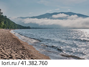 Sandy beach, Barguzinsky Bay of Lake Baikal. Descending fog on horizon. Стоковое фото, фотограф Ирина Кононова / Фотобанк Лори