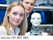 Молодые ученые в офисе с роботом. Generative AI. Стоковое AI-изображение, AI-художник Щеголева Ольга / Фотобанк Лори