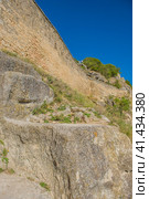 The remains of a medieval fortress city (according to other sources - a monastery) Tepe-Kermen, covering the upper part of the mountain in several tiers (2020 год). Стоковое фото, фотограф Анна Кривицкая / Фотобанк Лори