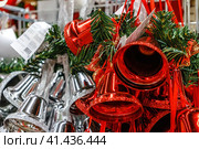 Colorful Christmas bells are hanging in a row. Стоковое фото, фотограф Галина Царькова / Фотобанк Лори