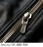 Zipper on clothes close-up. Generated by AI. Стоковое AI-изображение, AI-художник Ярославский Максим / Фотобанк Лори