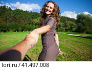 Follow me, Beautiful young woman holds the hand of a man. Стоковое фото, фотограф Андрей Аркуша / Фотобанк Лори