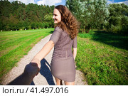 Follow me, Beautiful young woman holds the hand of a man. Стоковое фото, фотограф Андрей Аркуша / Фотобанк Лори