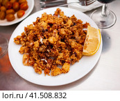 Chipirones, breaded fried calamari with lemon. Стоковое фото, фотограф Яков Филимонов / Фотобанк Лори
