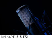 Studio black condenser microphone on black background. Стоковое фото, фотограф Александр Калугин / Фотобанк Лори