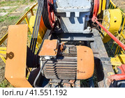 Electric drive and reducer pumping unit of an oil well. Стоковое фото, фотограф Леонид Еремейчук / Фотобанк Лори