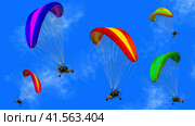 Several bright motorized paragliders with people against the blue sky. Colorful background with paragliders. Illustration. Стоковая иллюстрация, иллюстратор Бузмакова Светлана / Фотобанк Лори