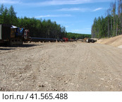 Construction of gas pipeline on the ground. Стоковое фото, фотограф Леонид Еремейчук / Фотобанк Лори