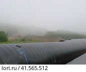 Construction of gas pipeline on the ground. Стоковое фото, фотограф Леонид Еремейчук / Фотобанк Лори