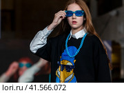 Показ одежды из коллекции VK Store в рамках фестиваля детской моды KIDS FASHION WEEK в "Центральном детском магазине на Лубянке" (ЦДМ) в центре города Москвы, Россия (2023 год). Редакционное фото, фотограф Николай Винокуров / Фотобанк Лори