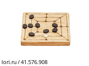 Mill game, popular in ancient Roman, isolated on a white background. Reconstruction of board games from the Roman Empire. Стоковое фото, фотограф Андрей Журавлев / Фотобанк Лори