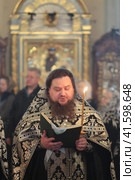 Литургия в Новодевичьем монастыре в Страстную пятницу (2018 год). Редакционное фото, фотограф Дмитрий Неумоин / Фотобанк Лори