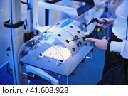 Simulators of surgical operations and suturing, a training robotic complex for teaching medicine. Стоковое фото, фотограф Андрей Журавлев / Фотобанк Лори