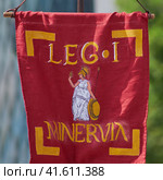 Red flag standard of Legion 1 Minervia the Ancient Roman Empire - Times and Epochs Festival, Moscow, Russia, June 08, 2023. Редакционное фото, фотограф Андрей Журавлев / Фотобанк Лори