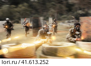 Paintball players of opposite teams in shootout. Стоковое фото, фотограф Яков Филимонов / Фотобанк Лори