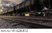 Cistern train with petroleum and crude oil transportation fuel via railroad. Стоковое видео, видеограф Олег Грач / Фотобанк Лори